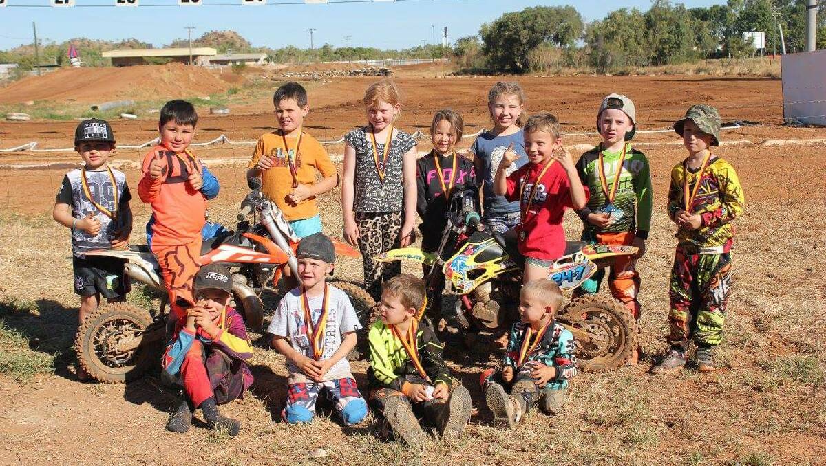 WELL DONE: Presentations to some of the junior riders at the May 28 Dirt Bike club event. See page 15 for story. Photo: contributed