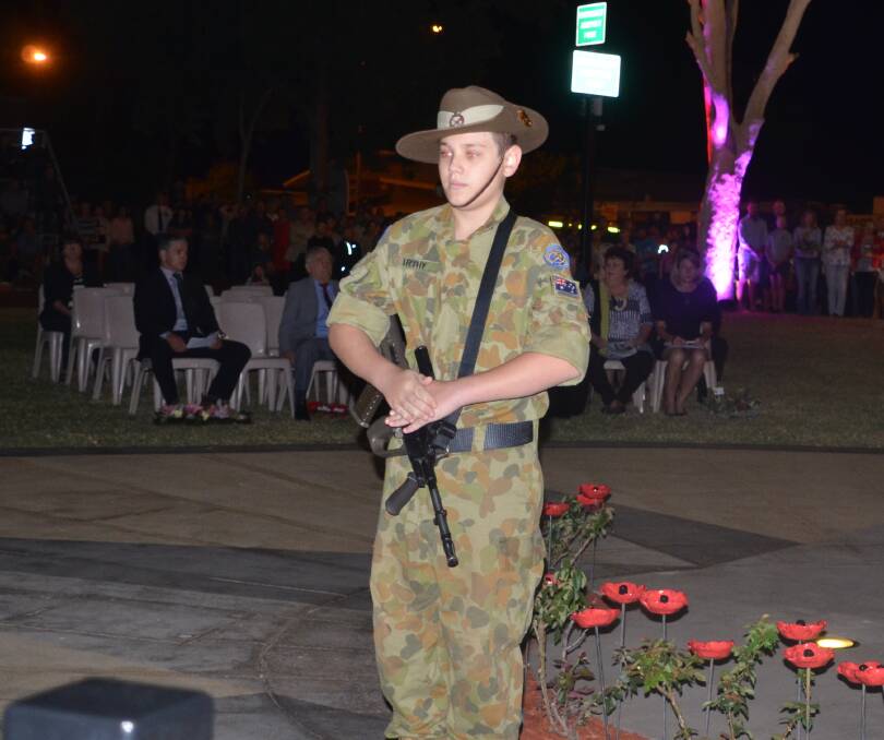 ON GUARD: One of the catalfaque party from the cadets at the Cenotaph ahead of the Mount Isa Dawn Service. Photo: Derek Barry