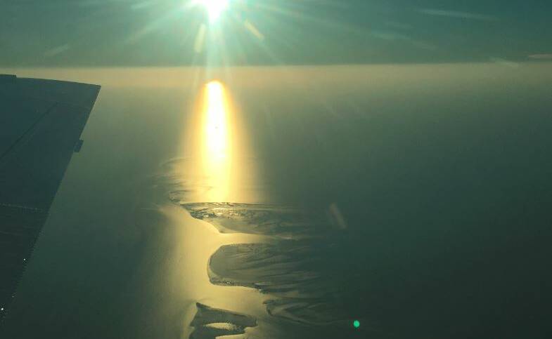 Sunset from the air over the Gulf of Carpentaria near Karumba.