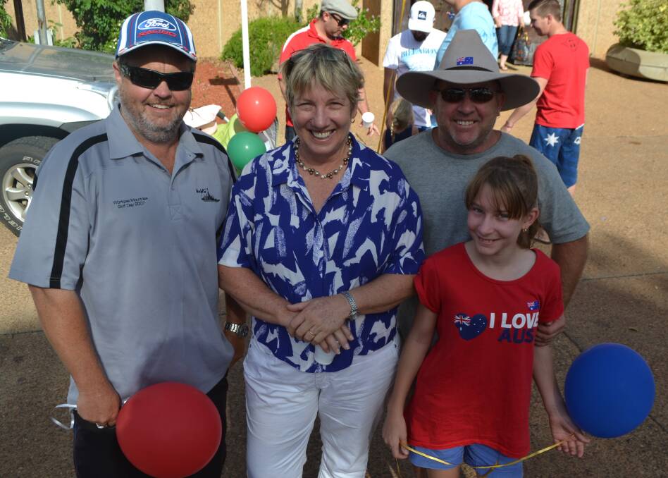 Rob Winter, Cr Anne Seymour, Anthony Ford and April Ford enjoy 2015 Australia Day celebrations in Mount Isa.