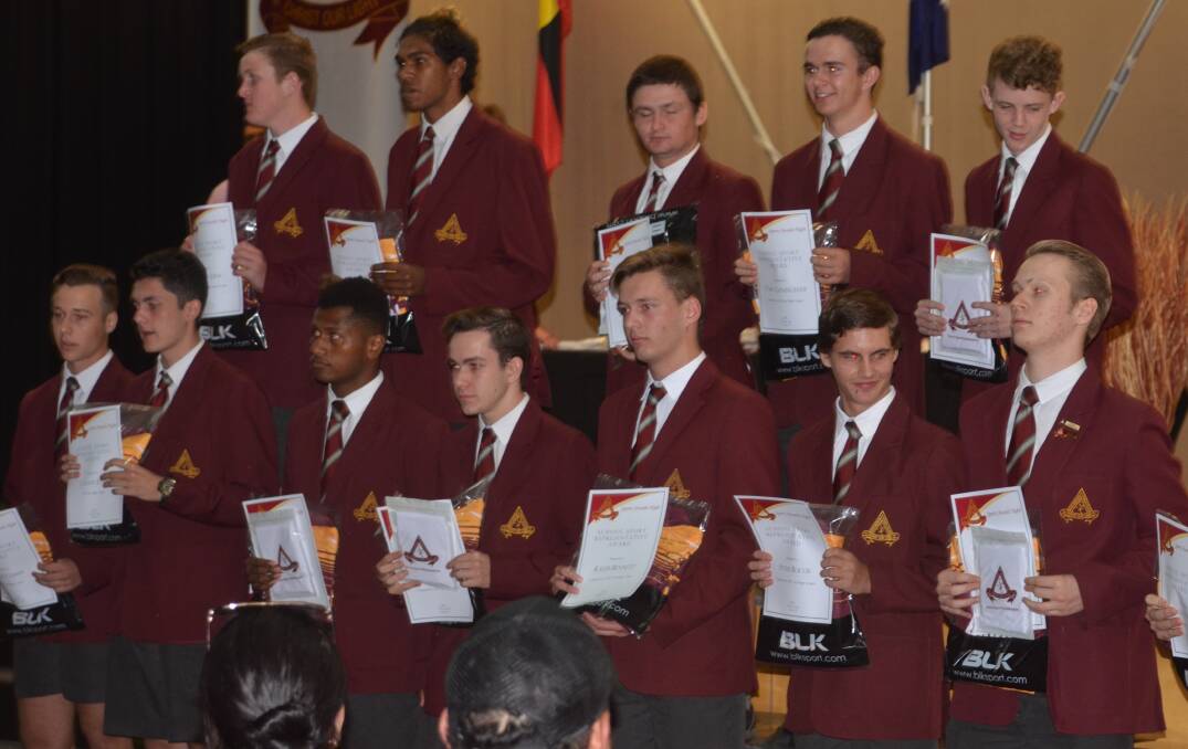 CERTIFICATES: Boys from the GIO Cup and Confraternity Cup are honoured at the Good Shepherd sports night. Photo: Derek Barry
