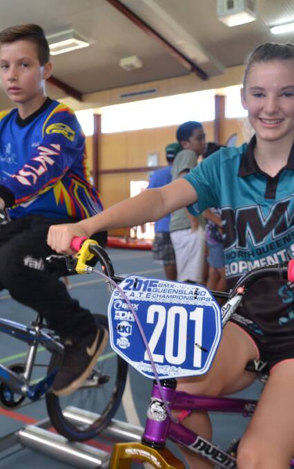 BMX Bandits: Bailey Foschi and Lisa Hetherington try out the BMX bikes at the Super Sports Expo. Photo: Derek Barry