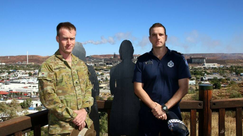 Major Jeremy Barraclough and Sergeant Matt Ward support the message of White Ribbon in Mount Isa.