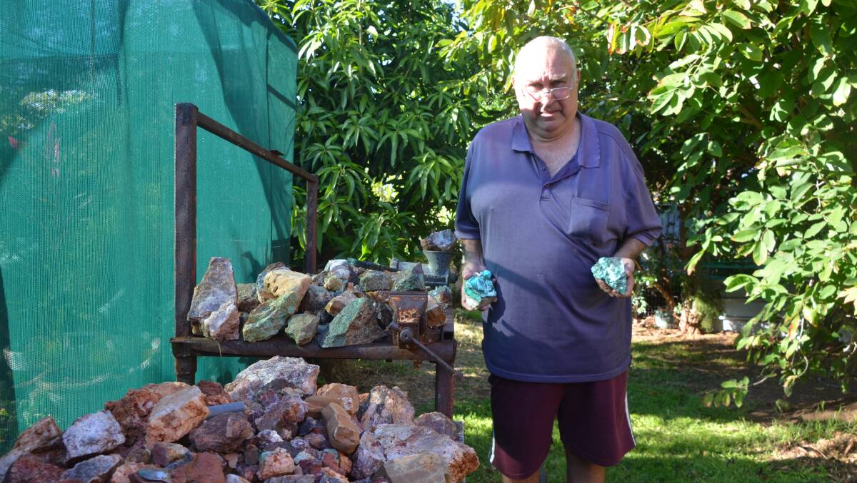 COPPER MAN: Joe Rogers, seen here at his Mount Isa home with samples of his ores. believes he is being cheated out of his mining lease. Photo: Derek Barry