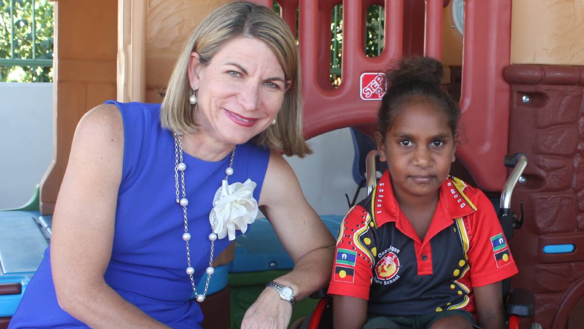 Mayor Joyce McCulloch with Melissa Peter, 9, a rheumatic heart patient at the 
Mount Isa Base Hospital.