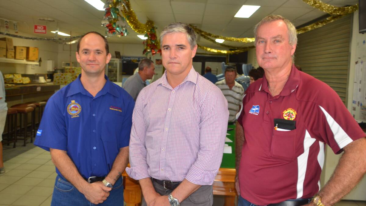 Peter Robins (left) and Les Moffitt (right) from the Rail, Tram & Bus Union with Robbie Katter MP.