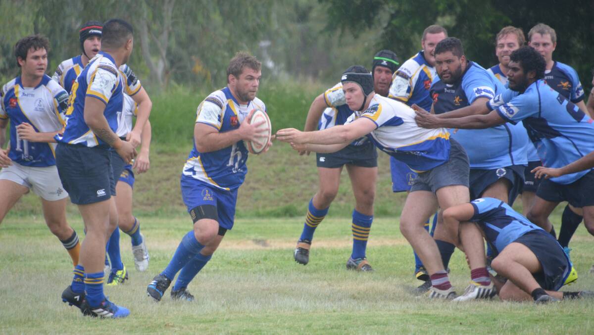 CURRY POWDER: Cloncurry launch an attack in their game against Keas on Saturday. Photo: Derek Barry