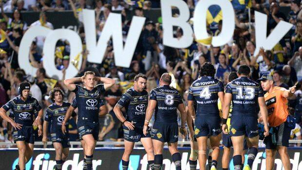 Ponga and the Cowboys re-group during their game against the Broncos. Photo: Fairfax.