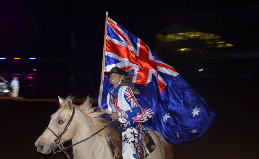LOCAL STAR: Miss Rodeo Australia Katy Scott from Cloncurry, enters the arena on night 1 of the Mount Isa Rodeo. Pgoto: Derek Barry