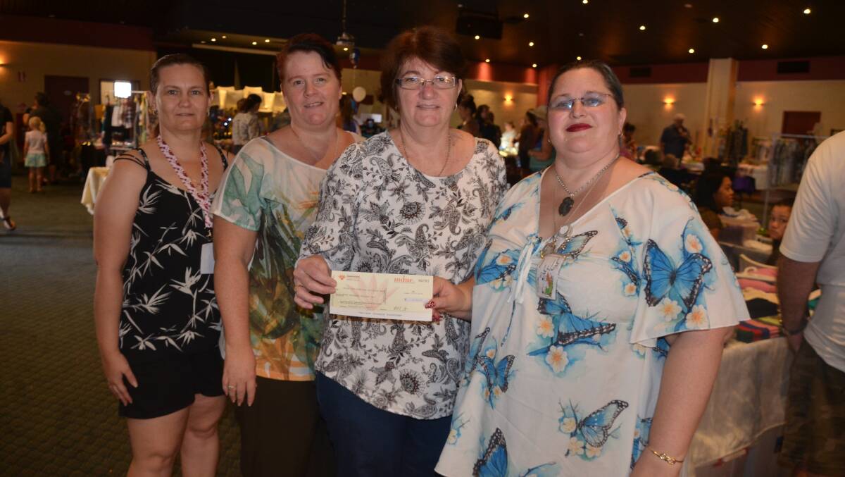 GOOD DEEDS: The hospital's Sue Ryan (third left) accepts a cheque from the Market's Gail Power, Necia Shonhan and Vicky Winter. Photos: Derek Barry