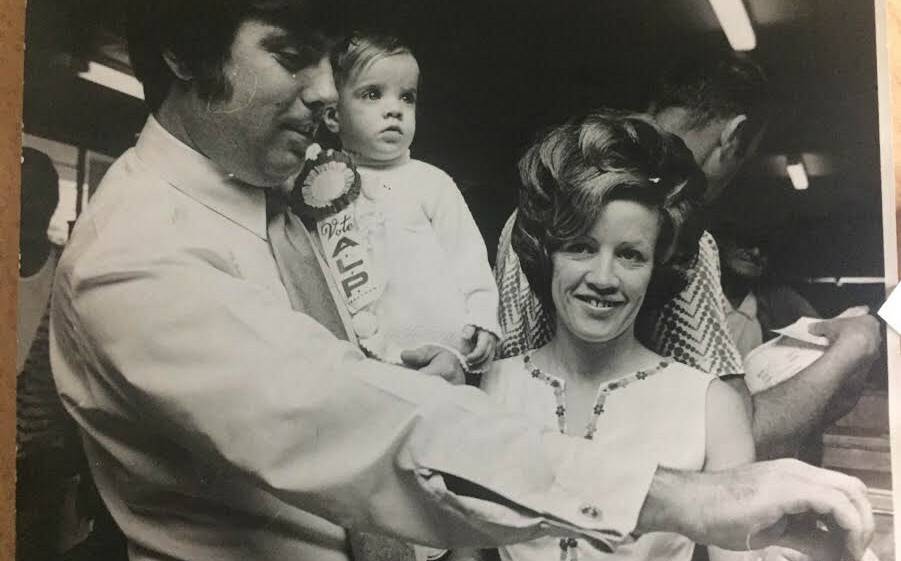 CANDIDATE: Tony McGrady votes in the 1974 federal election with wife Sandra and baby daughter Susan. 