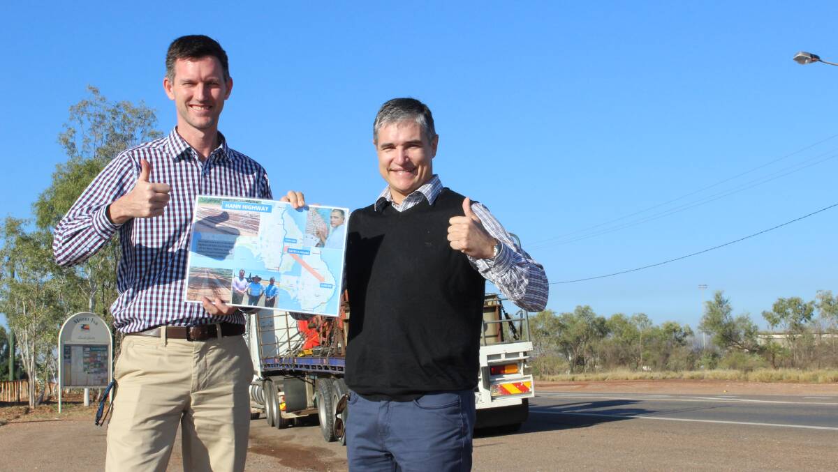 Minister Mark Bailey and Robbie Katter give the thumbs up to the Hann Hwy sealing plan.