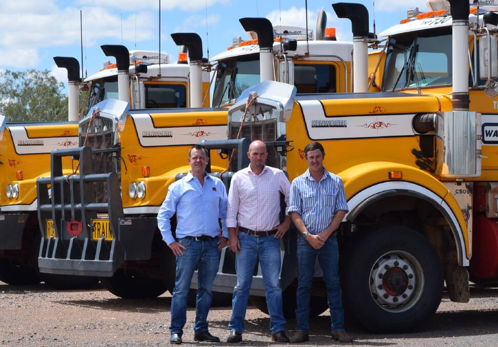 HUB: Sam Rodda (MMG Dugald River), Mayor Greg Campbell and Jack Wagner (Wagners) hail Cloncurry's transport success. Photo: contributed