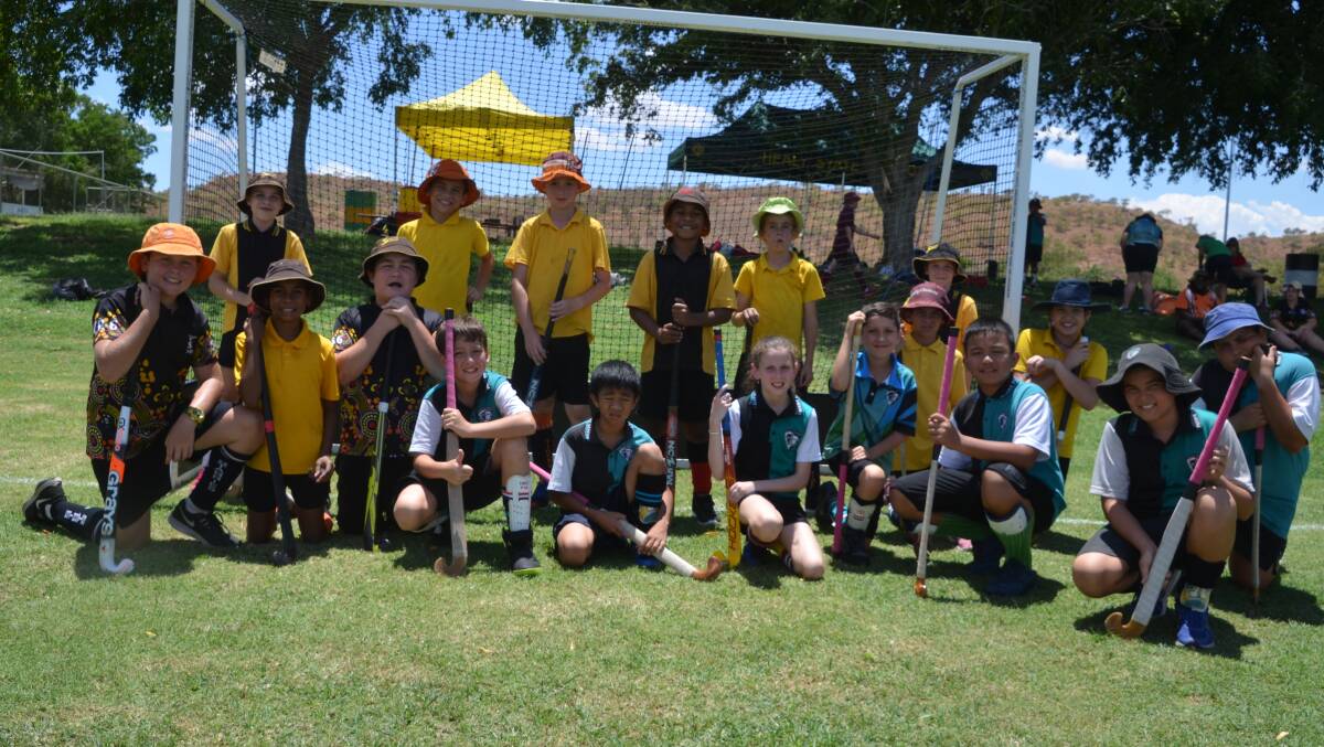 TEAM EFFORT: Players from Sunset and Central schools enjoy the Remote and Indigenous Hockey Program in Mount Isa. Photo: Derek Barry
