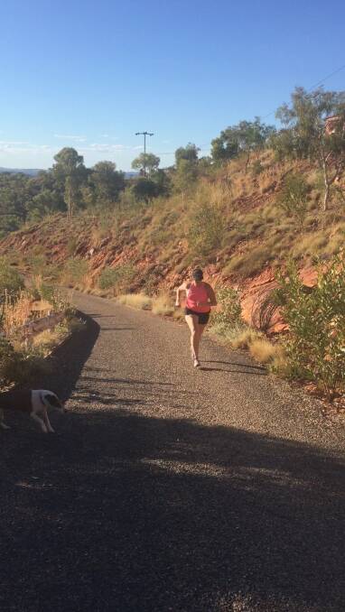 Kate does the hard yards up the hills of Mount Isa.