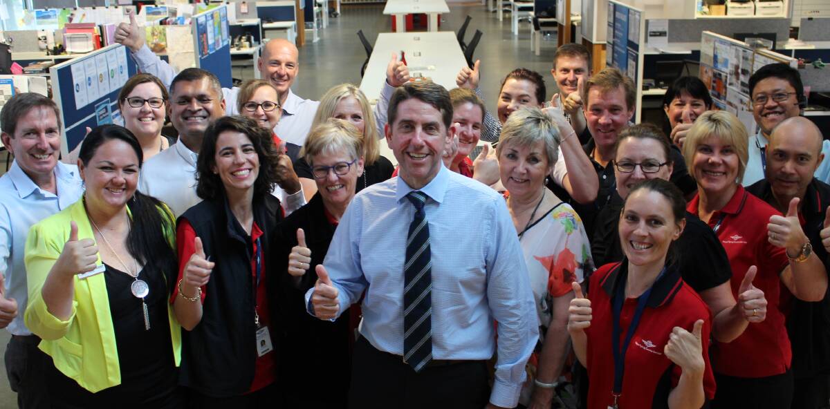 Minister Cameron Dick, and representatives from Mount Isa RFDS, Uniting Community Care and NWHHS give the new funding the thumbs up.