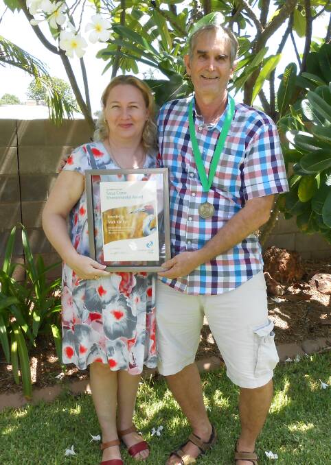 EFFORT RECOGNISED: Mark Van Ryt celebrates his Australia Day enevironmental award with wife Natalia. Photo: contributed