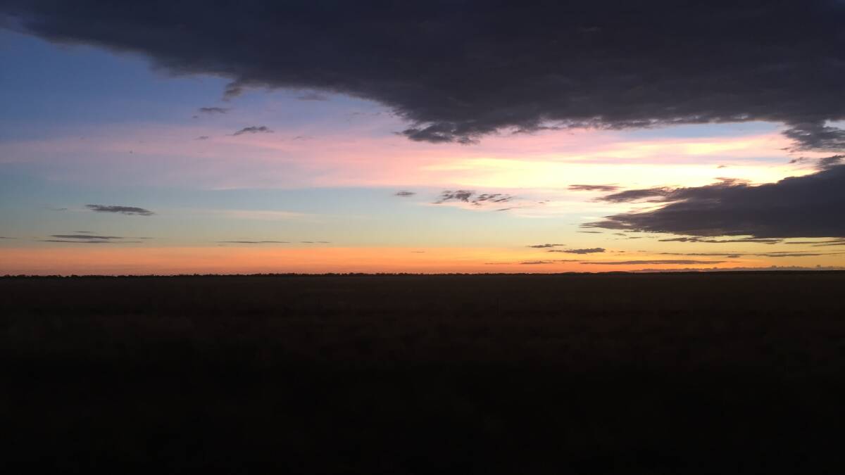EARLY MORNING: Photo taken on the road out of Mount Isa towards Boulia as rare winter rainclouds threaten on Thursday morning. Photo: Derek Barry