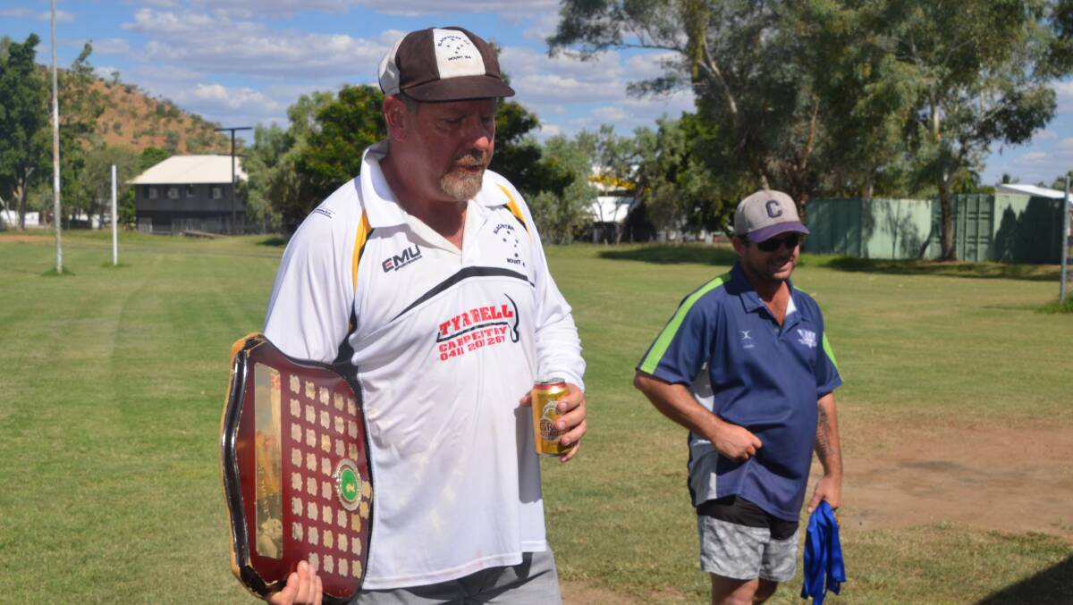 CAPTAIN'S CALL: Black Stars' skipper Andrew Lawrenson accepts the shield as winners of the Bell & Moir Toyota Mount Isa Cricket Association trophy. Photo: Derek Barry