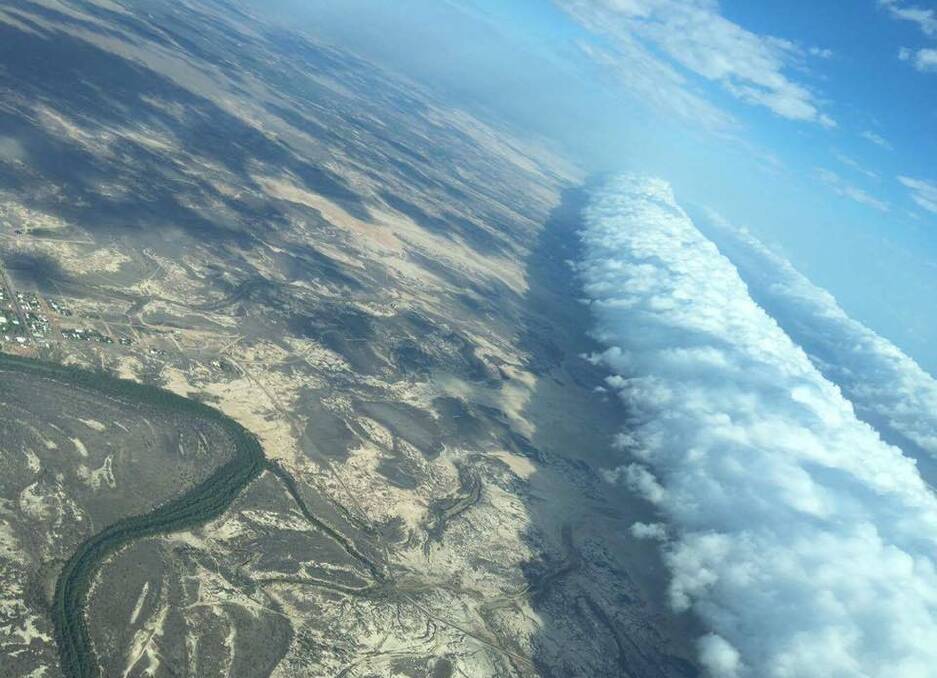 ROLLING WAVE: This photo of the morning glory cloud approaching Burketown (centre left on the river) was snapped by Savannah Aviation and shared by Burke Shire Council.