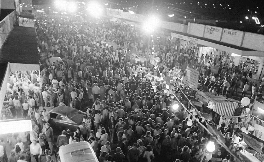 Mardi Gras 1975 looking down West Street.  