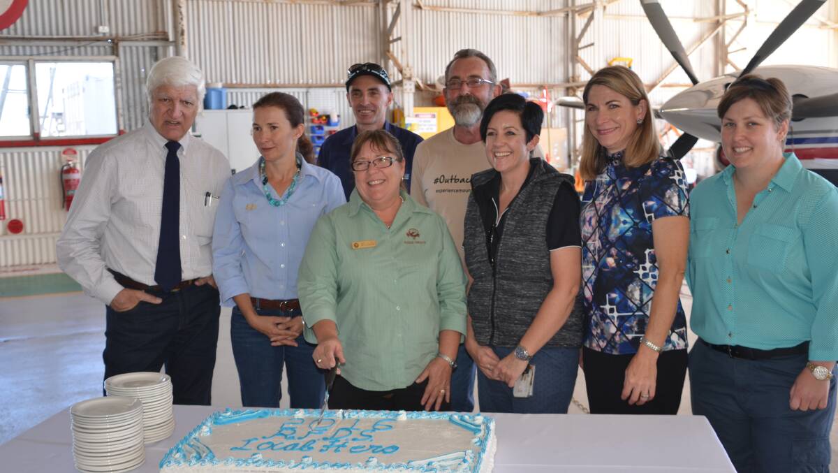 Michelle Low Mow cuts the cake at the RFDS event on Tuesday.