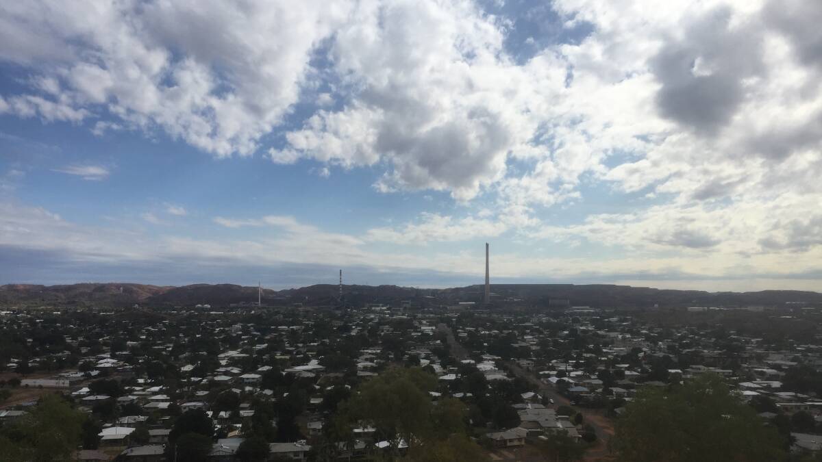 Clouds hover around Mount Isa on Sunday but didn't deliver much rain.