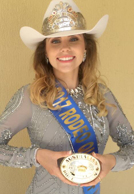 Bessie Smits displays the buckle she gets for winning 2017 Rodeo Queen of Australia.