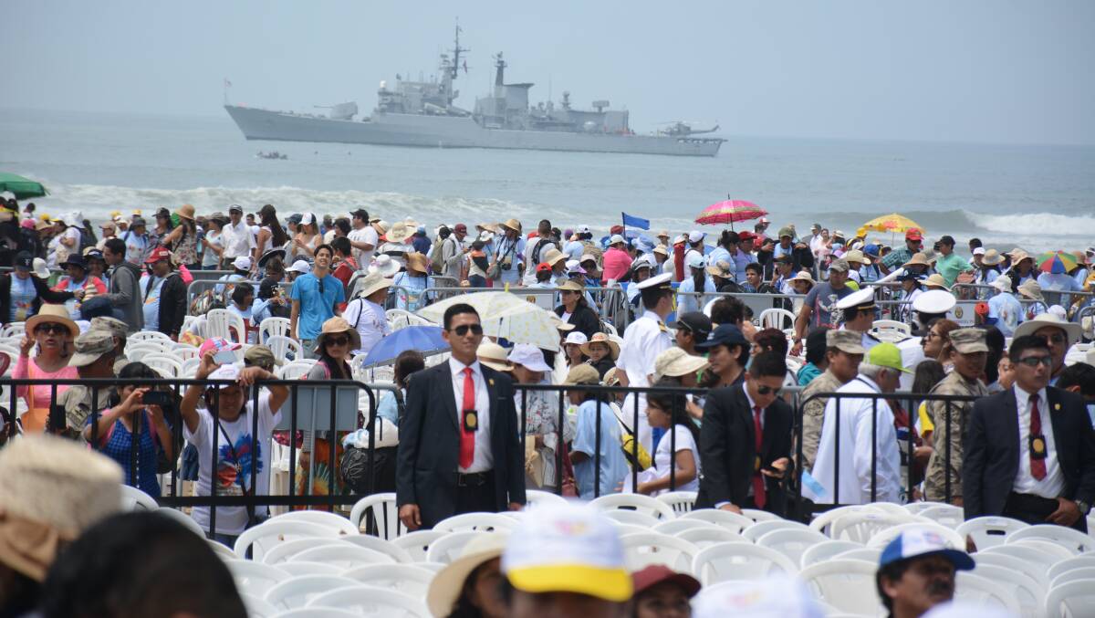 The security and crowd after a mass service led by Pope Francis in Huanchaco in January. Chris said it was incredible to think the Pope visited the suburb he was living in. 