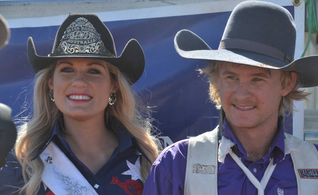 Miss Rodeo Australia Katy Scott with Division 2 saddle bronc winner Tristan Braden at the Curry Merry Muster on Saturday.