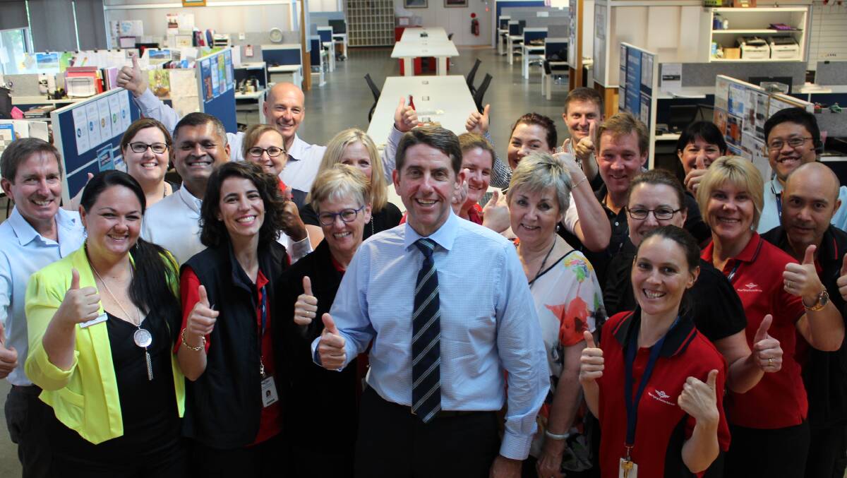 Minister Cameron Dick and RFDS staff given the thumbs up to the new grant.