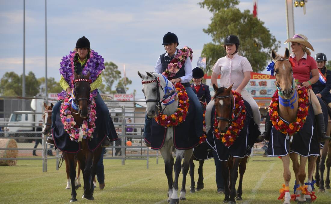 Riders in the grand parade at the Cloncurry Show.