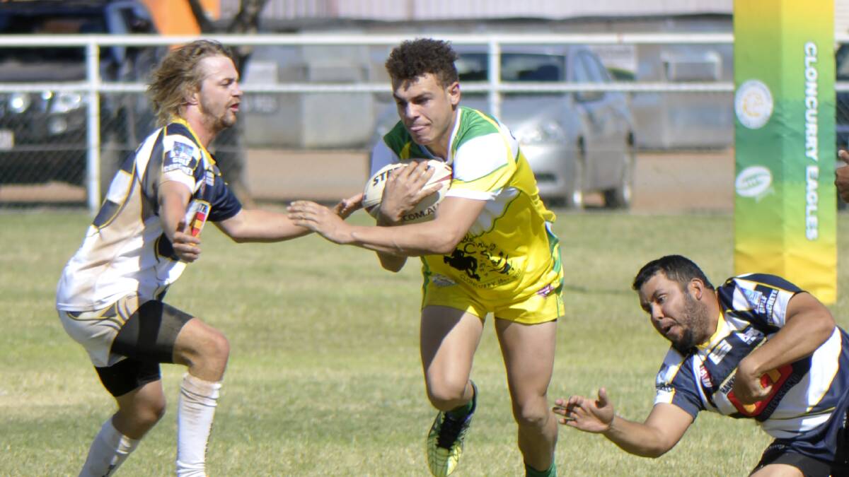 GAME ON: Action from the Cloncurry (in green) versus Normanton game. Photo: Robbie Katter's office.