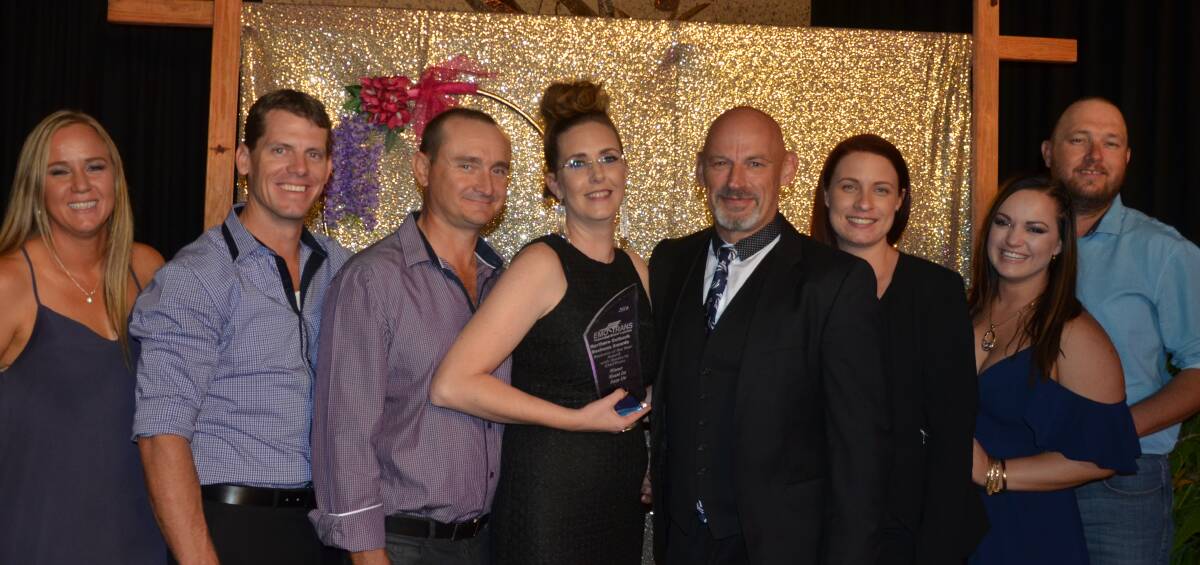WINNERS: The Isuzu team celebrate winning business of the year at the 2016 EMO Trans  Northern Outback Business Awards. Photo: Derek Barry