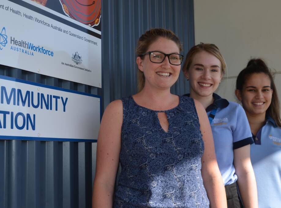 THERAPY: North West Community Rehab Occupational Therapist Louise Massie with students Kaitlan O'Connell and Carla Littlefield. Photo: Derek Barry