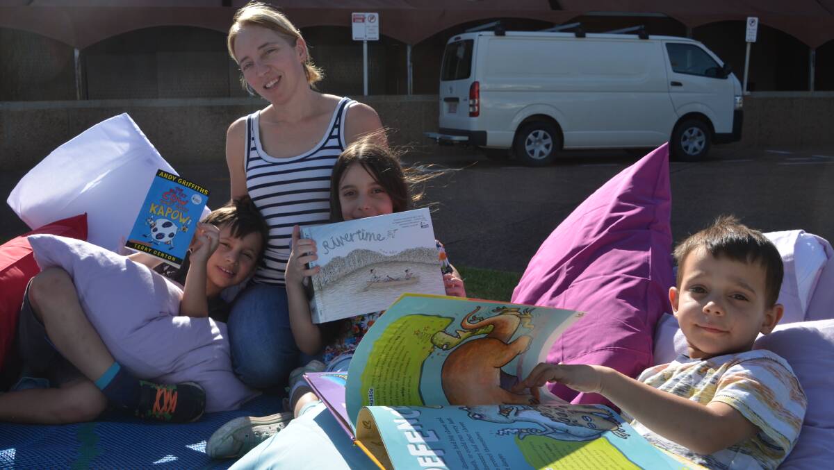 Enjoying a good read are Benjamin, Vicky, Michelle and Jamie Botha.