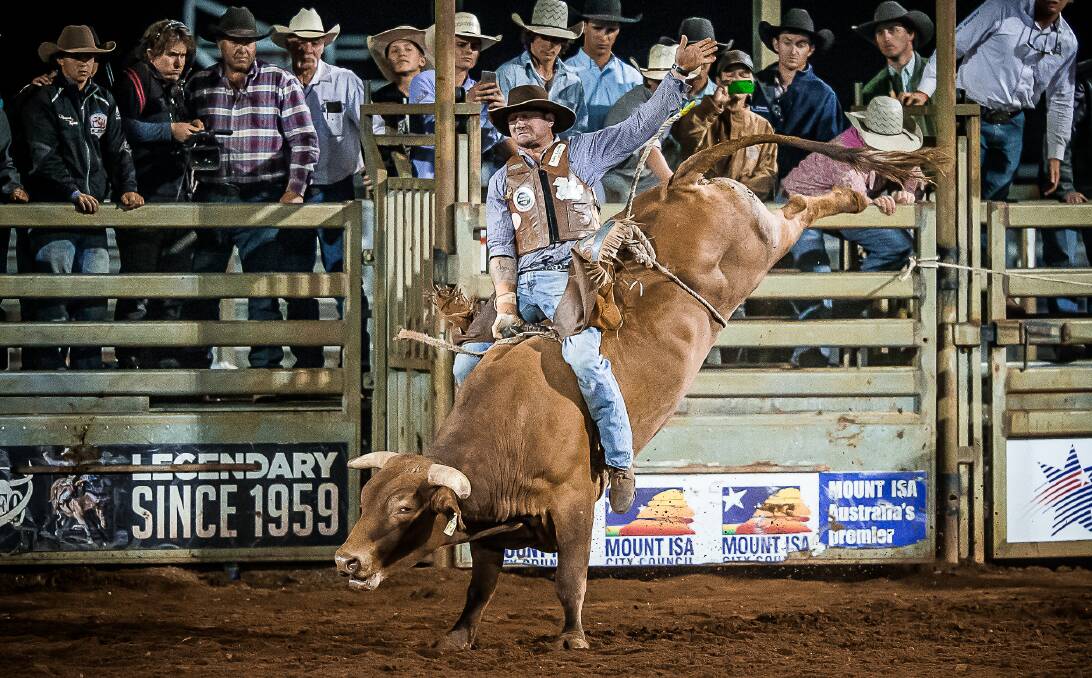 Mark Lamberth on board 'Spin To Win' for 84 points to win the 2015 Mount Isa Open Bull ride.