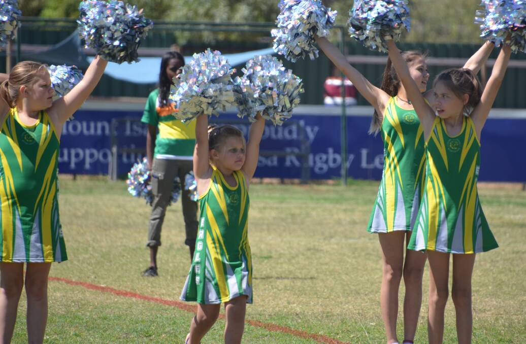 Curry cheer squad in action at Alec Inch Oval at half time during their game.