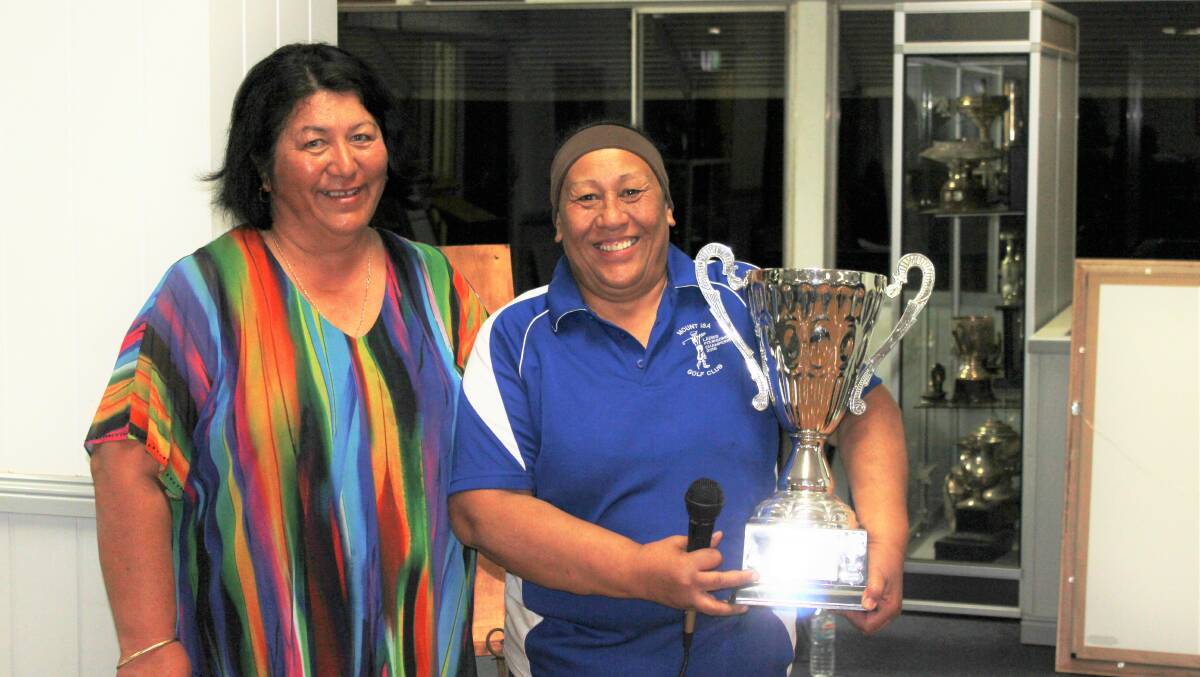 Angie Sciascia holding her trophy which was presented by ladies captain Auretta Perrin.