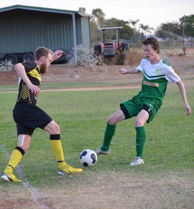 DUEL: Atlas A winger Andrew Frahm takes on his opposite Jordan Hennessey of Parkside A. Hennessey scored the second goal for his team. Picture: Tom Adam