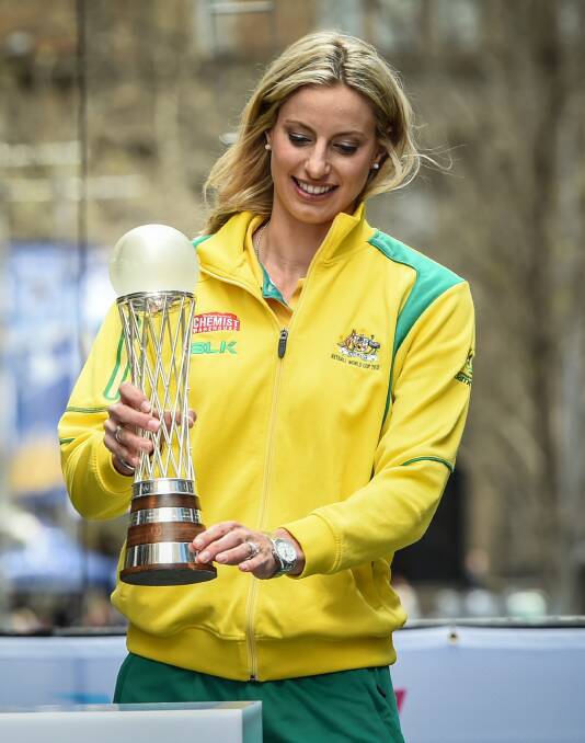 SUCCESS: Australian netball captain Laura Geitz with the Netball World Cup trophy. Picture: Brendan Esposito