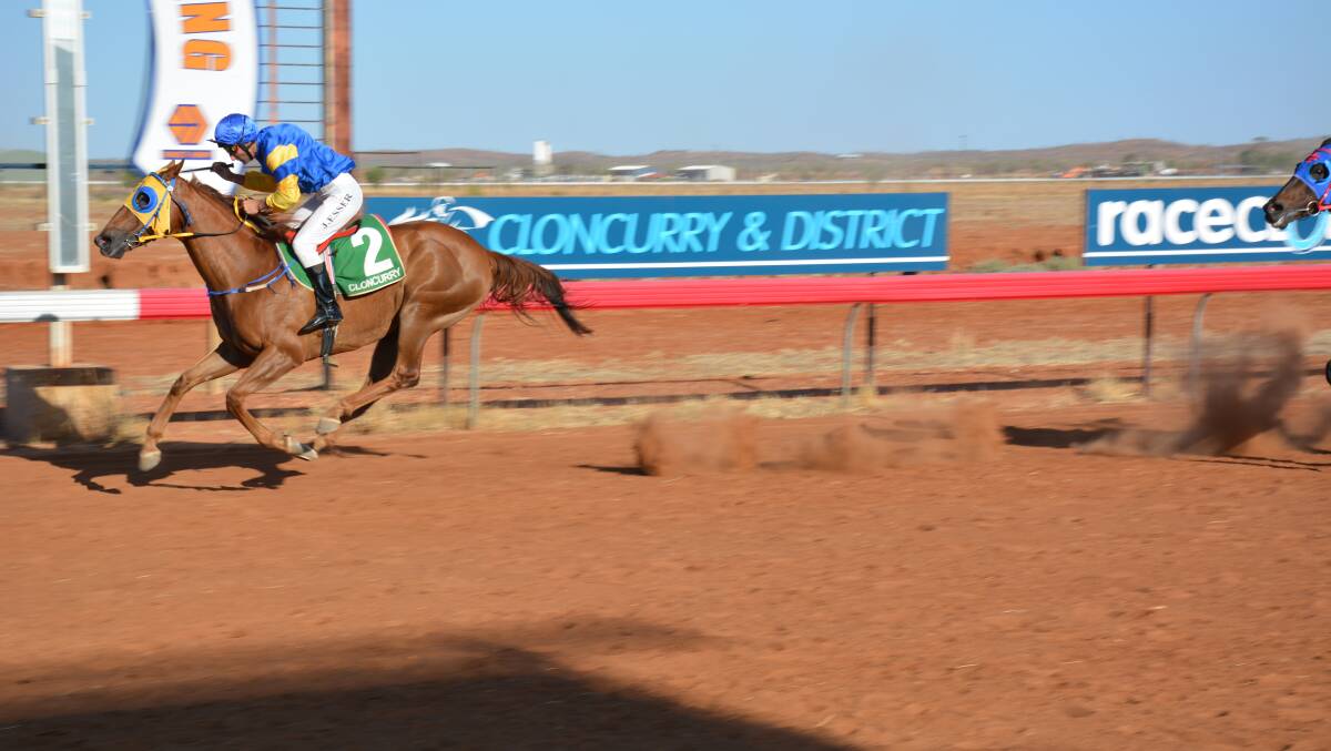 Carry Me, ridden by Justin Esser, crosses the finish in the Brodie Hardware Cloncurry Cup Open Handicap on Saturday.