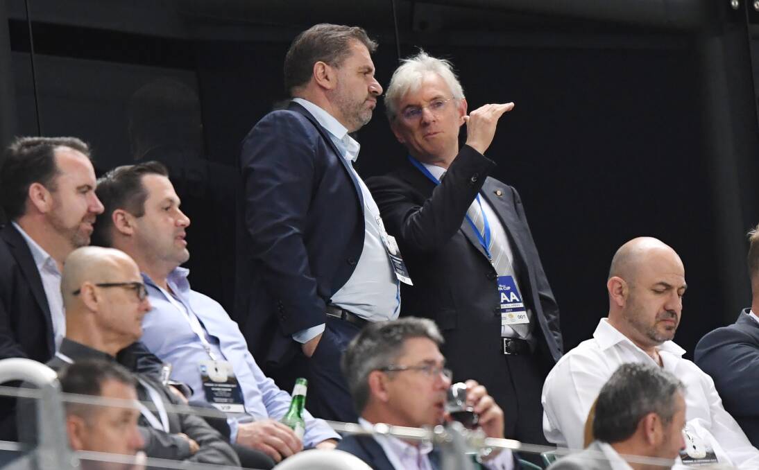 Australia Socceroos head coach Ange Postecoglou (left) speaks with Football Federation Australia chairman Steven Lowy during the FFA Cup final. Picture: AAP Image/David Moir