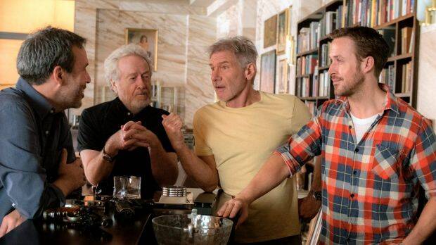 From left, Denis Villeneuve, Ridley Scott, Harrison Ford and Ryan Gosling on set. Photo: Stephen Vaughan

