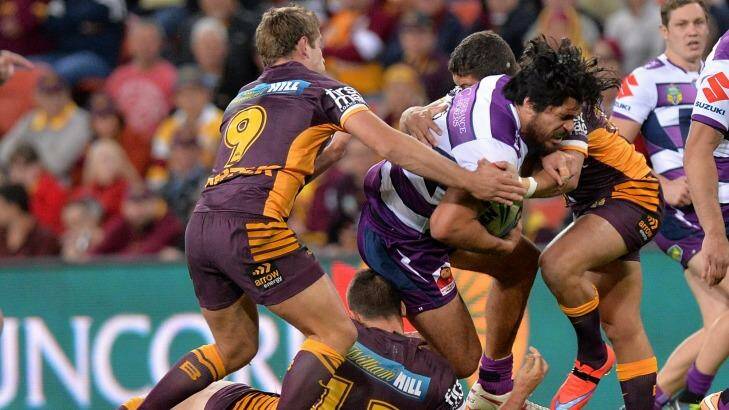 Hard yards: Tohu Harris takes it up into the Brisbane defence. Photo: Getty Images 
