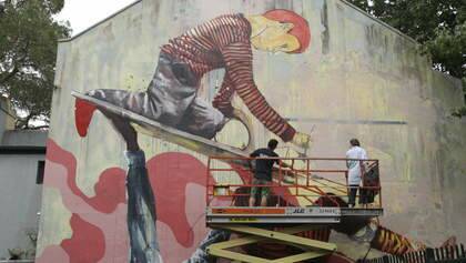 Photograph shows street artist/painter and muralist Fintan Magee working on a new mural in Wooloomooloo today.Photograph by Dean Sewell.S.M.H.News.Taken Friday 28th March 2014.

das140328.001.002.send.jpg Photo: dsewell@oculi.com.au
