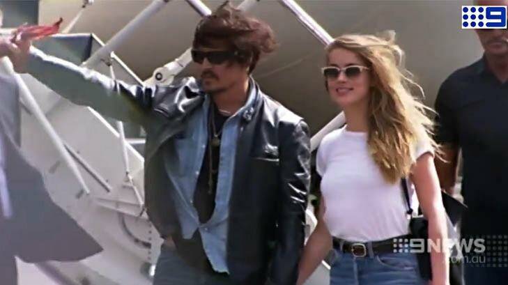 Johnny Depp and Amanda Heard at Brisbane Airport. Photo: Nine News