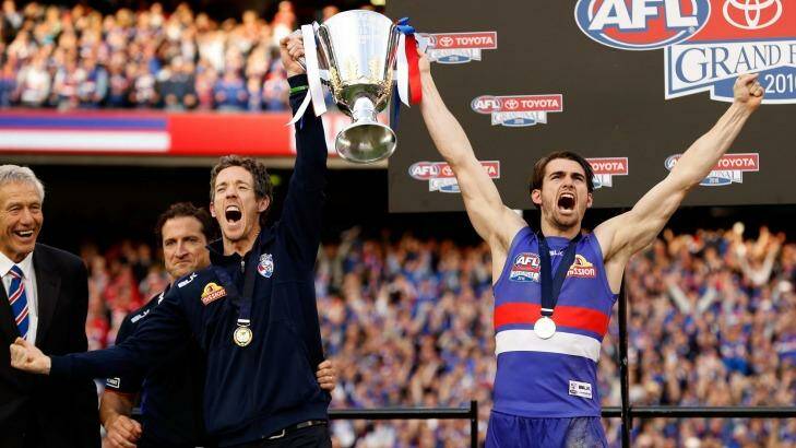 Bob Murphy and Easton Wood hold the 2016 cup aloft. Photo: AFL Media/Getty Images