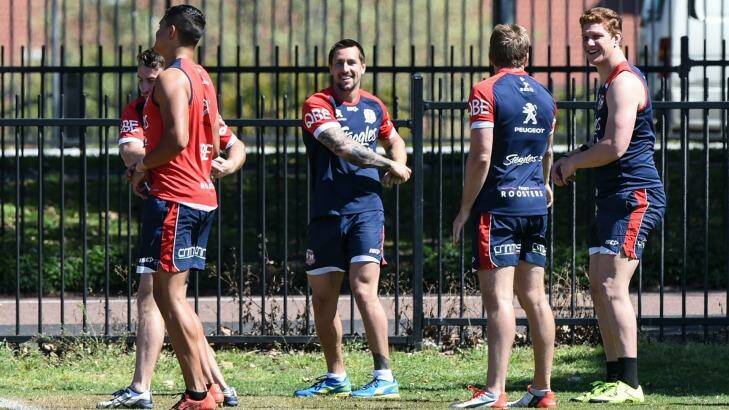 Rooster returns: Mitchell Pearce, centre, has been named in the Sydney Roosters line-up for their grand final qualifier against the Broncos. Photo: Brendan Esposito