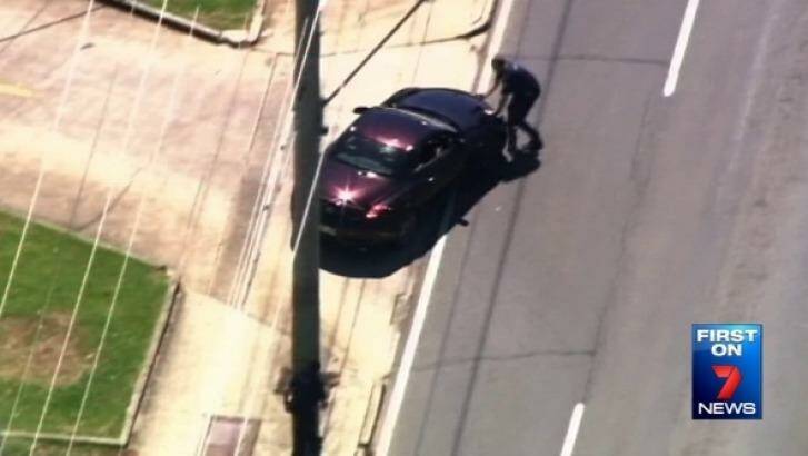 An aerial shot of the incident, which left the police officer injured and in the middle of the road. Photo: Seven News
